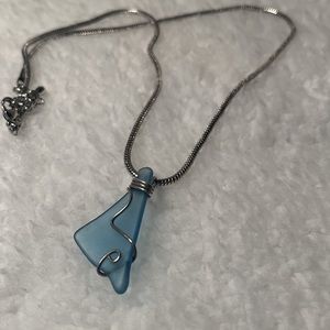 Sea glass pendant on silver necklace